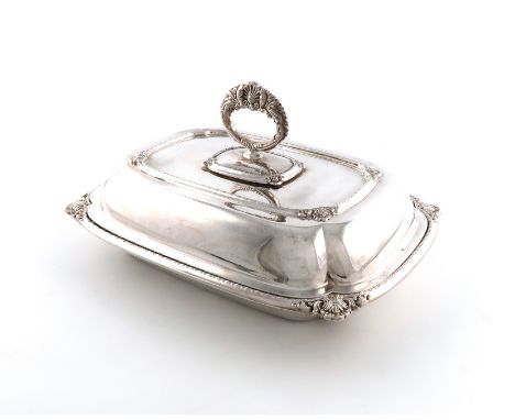 A silver entrée dish and cover, by Stevenson &amp; Law, Sheffield 1931, rounded rectangular form, shell and foliate border, d