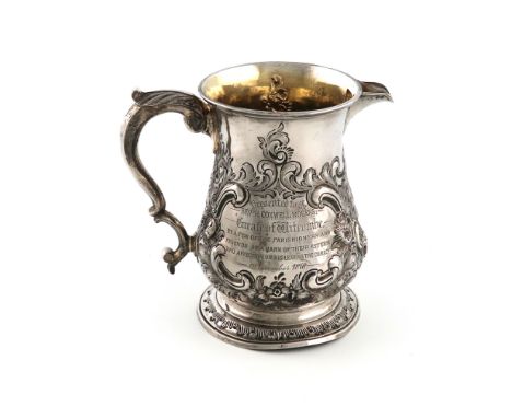 A George II later spouted silver mug, by William Shaw &amp; William Priest, London 1755, the spout with addition marks for Lo