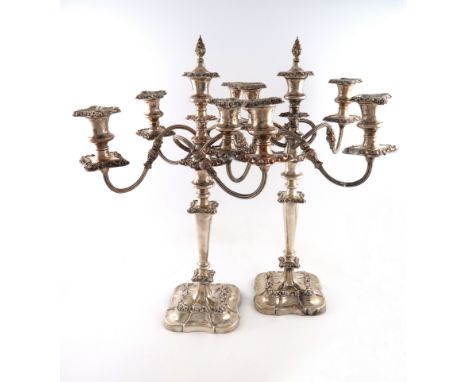 A pair of modern silver five-light candelabra, by the Barker Ellis Silver Co., Birmingham 1967, tapering circular columns, fo