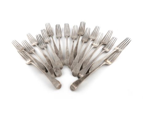 A matched set of eighteen George III silver Old English pattern table forks, various dates and makers, the terminals with cre