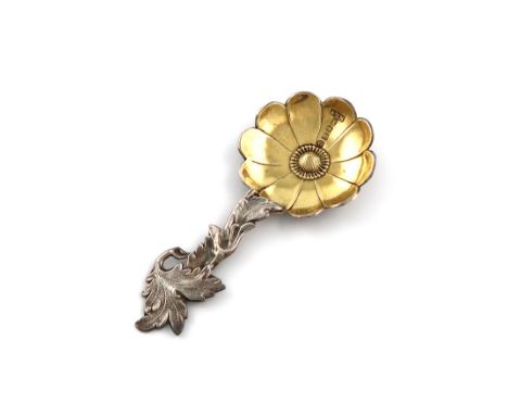 An early Victorian parcel-gilt silver caddy spoon, by Hilliard and Thomason, Birmingham 1853, the bowl of flower head form, p
