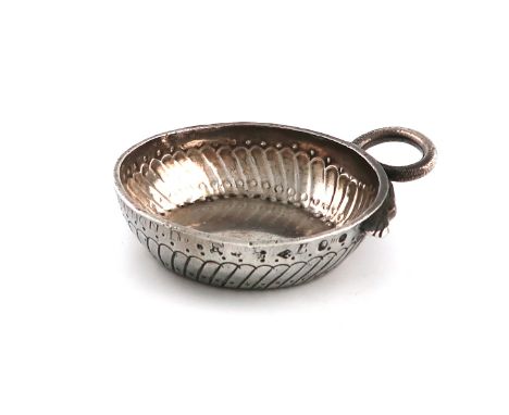 An early 19th century French provincial silver wine taster, maker's mark J.F over G in a lozenge, 1809-19, circular form, par