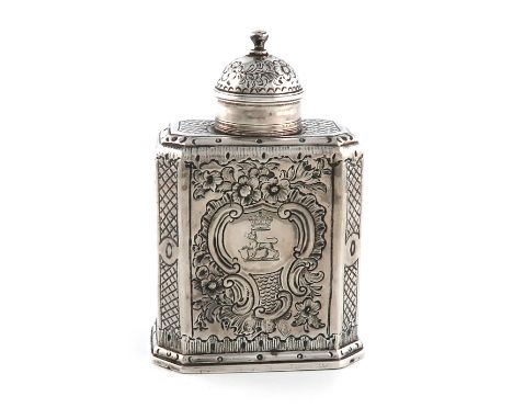 A George I silver tea caddy, by John Farnell, London 1716, upright rectangular form, canted corners, later chased foliate scr