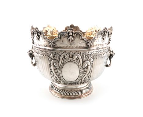 An Edwardian silver Monteith bowl, possibly by John Griffiths, London 1901, circular form, fluted decoration, lion mask drop 