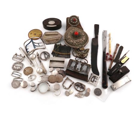 A mixed lot, comprising silver items: ten buckles, a rattle, three buttons, a pair of cufflinks, various dress studs, a pair 