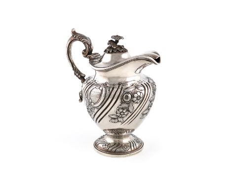 A William IV silver hot water pot, by J and J Angell, London 1836, baluster form, leaf capped scroll handle, the hinged cover