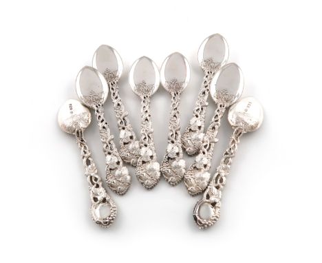 A set of eight Victorian silver pierced Vine pattern ice cream spoons, by Holland, Aldwinckle &amp; Slater, London 1896, plai