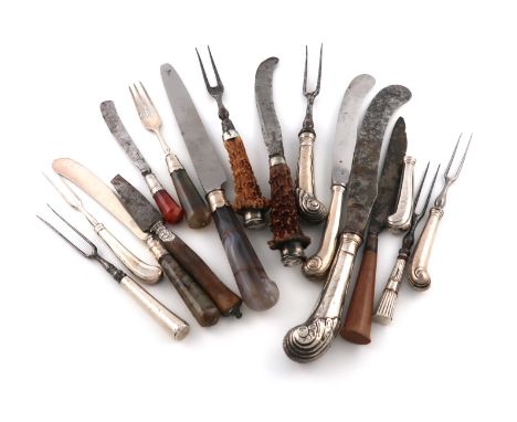 A mixed lot of flatware, comprising: an 18th century knife and fork, with antler stag handles and silver terminals, the fork 