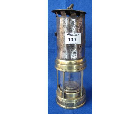 Vintage brass miner's safety lamp.