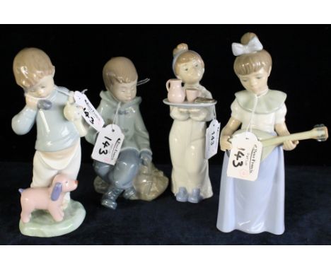 Four Nao Spanish porcelain figures of children with teddy bears, playing instruments etc. (4)