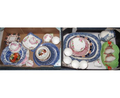 Two trays of assorted china to include: pair of USSR seated ladies with baskets; blue and white oval meat dish; various teawa