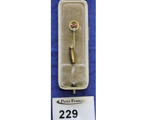 15ct gold stick pin set with pearl and ruby, in box.