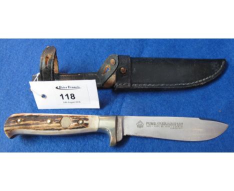 Puma 'Jagoa-nicker' steel bladed, horn handled hunting knife in leather scabbard. CONDITION REPORT: Serial no: 39382