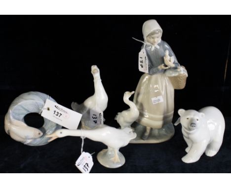 Five Spanish porcelain ornaments to include four Lladro and one Nao, animals and girl. (5)