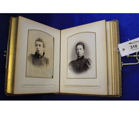 Small leather bound Victorian portrait album containing various family and individual portraits.