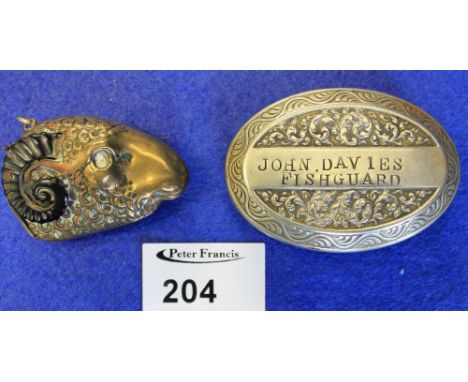 White metal oval snuff box marked: John Davies, Fishguard together with novelty ram's head Vesta case. (2)