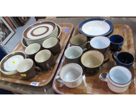 Two trays of assorted Denby and other pottery items to include: mugs; saucers; plates and bowls.  (2)