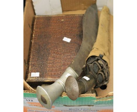 Box of assorted items to include: white metal Eastern design napkin rings; boxed EPNS knife and fork set and two Kukri, one i