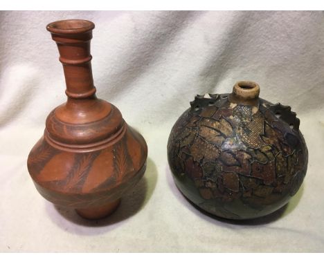 Two ceramic water carriers, one with decoupage 