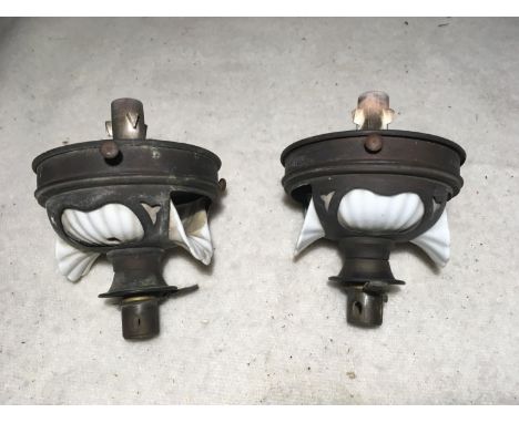 Pair of brass lamp fittings with unusual ceramic shell design 