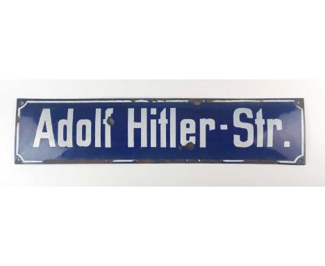 A German Third Reich enamel street sign, 'Adolf Hitler-Str.', of slightly convex form, blue and white, single hole to each co
