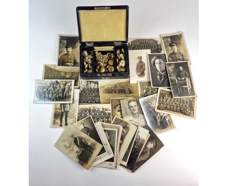 A group of approximately thirty-seven British photographs and postcards, WW1 and WW2. Individual studio and group portraits, 