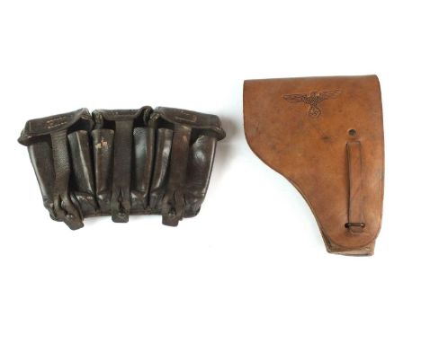 A German Second World War leather pistol holster for the French MAB model D, with eagle and swastika emblem to the front, the