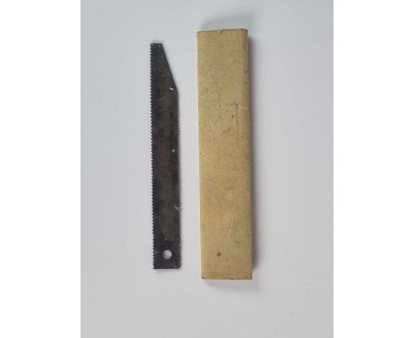 A scarce Second World War Air Force / SOE escape and evasion saw, the small hacksaw blade housed in the original brown card c