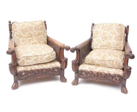 Late Victorian mahogany Bergere suite comprising a three-seater sofa and two matching easy chairs, the cresting rails all mou