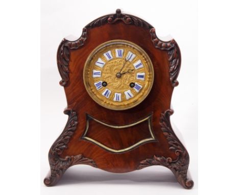 Early/mid-19th century mahogany clock case of waisted and domed rectangular design with later striking movement, having blue 