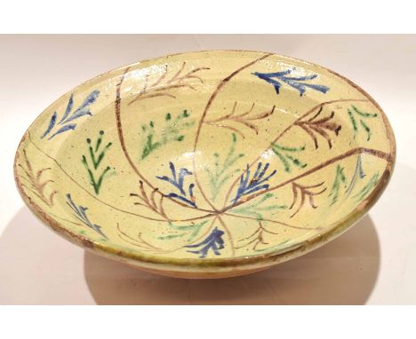 Large pottery bowl with a painted arrow and dart design, 38cm diam 