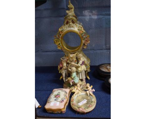 Group of Continental porcelain including a mirror, box and cover, 19th century Meissen figure group (damage and losses) and a