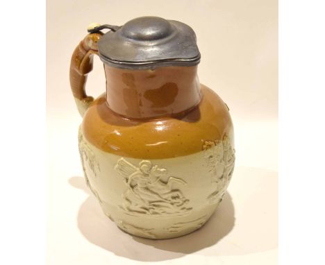 Late 19th century hunting ware jug with pewter mounts, the two tone body with relief decoration with handle modelled as a fox