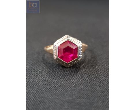 9 CARAT GOLD RING WITH SYNTHETIC RUBY 