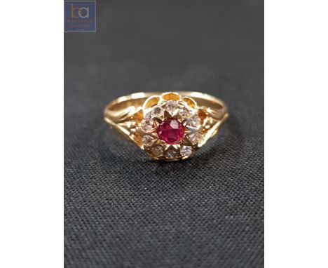18 CARAT GOLD RUBY AND DIAMOND RING 