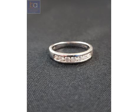18 CARAT WHITE GOLD AND DIAMOND 7 STONE RING WITH 0.33 CARAT OF DIAMONDS 