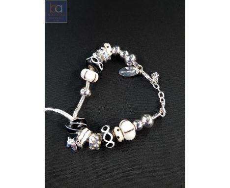 NEWBRIDGE BRACELET WITH ENAMEL CHARMS 