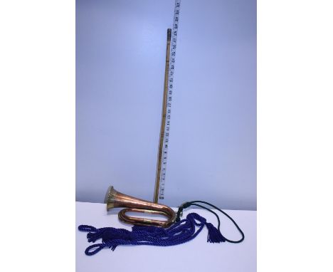 A military bugle with lanyards and a West Riding Regiment swagger stick. Shipping unavailable 