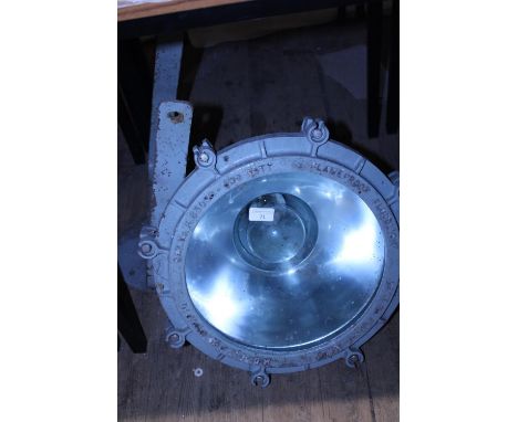 A vintage heavy cast metal framed flood light with bracket, shipping unavailable 