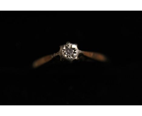 A hallmarked 9ct gold and diamond solitaire ring size N 1.32g 