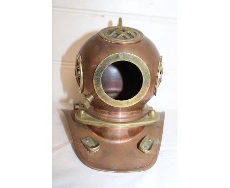 A novelty copper and brass divers helmet 