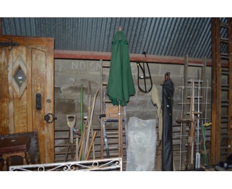 A garden parasol; a wooden ladder; metal set of steps; basket and contents etc.