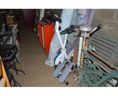 An exercise bike and a step exerciser