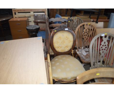 A Victorian mahogany bedroom chair; together with an oak ladder back chair 