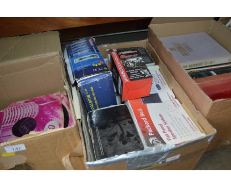 A quantity of speaker sets; a car stereo and a car window screen holder