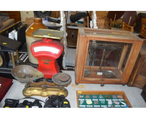 A set of Avery scales; a set of kitchen scales and weights and a chemists scales in fitted case