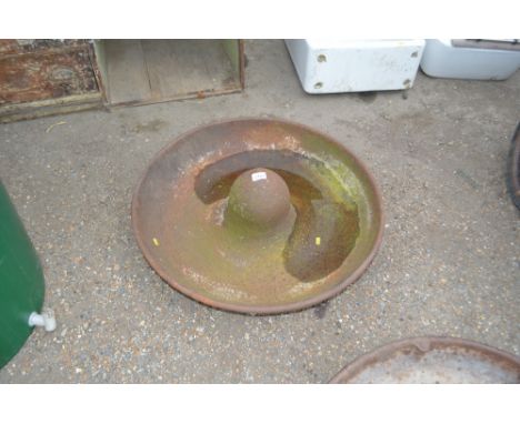 A cast iron pig trough 