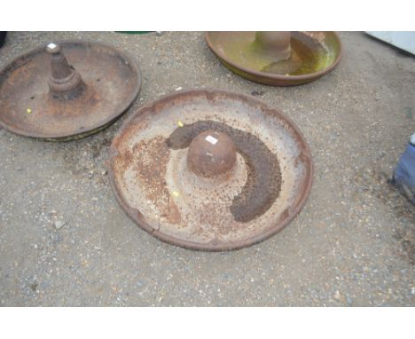 A cast iron pig trough 