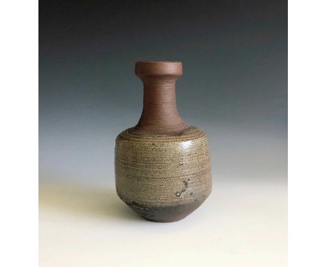 A Janet Leach bottle neck vase, impressed makers mark and Leach Pottery seal, height 16cm.