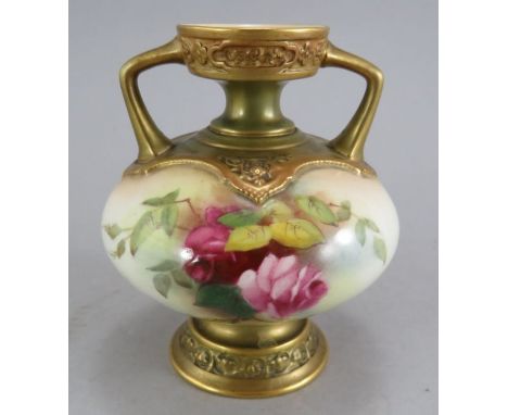 An early twentieth century Royal Worcester blush ivory two-handled vase, c. 1900. It is decorated to both sides with hand-pai